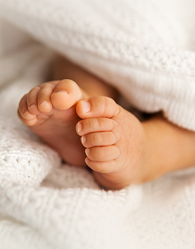 Affording Care - baby feet Affording Care