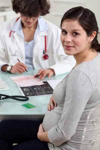 pregnant woman at the doctor